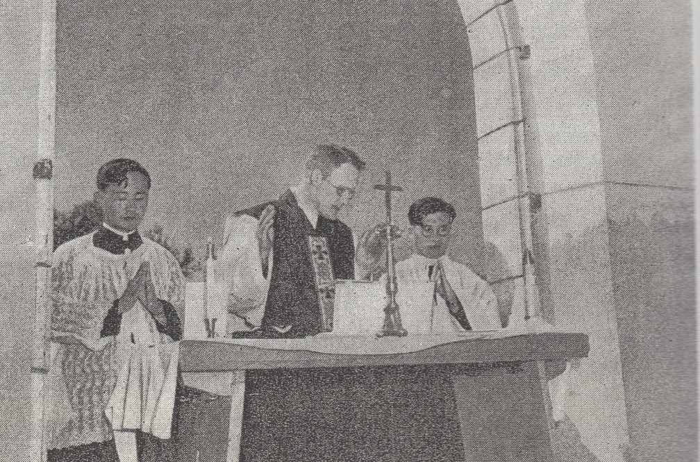 Father Geraghty celebrates Requiem Mass for Fathers Tony Collier and Paddy Reilly at the altar set in the doorway of the ruined Cathedral.